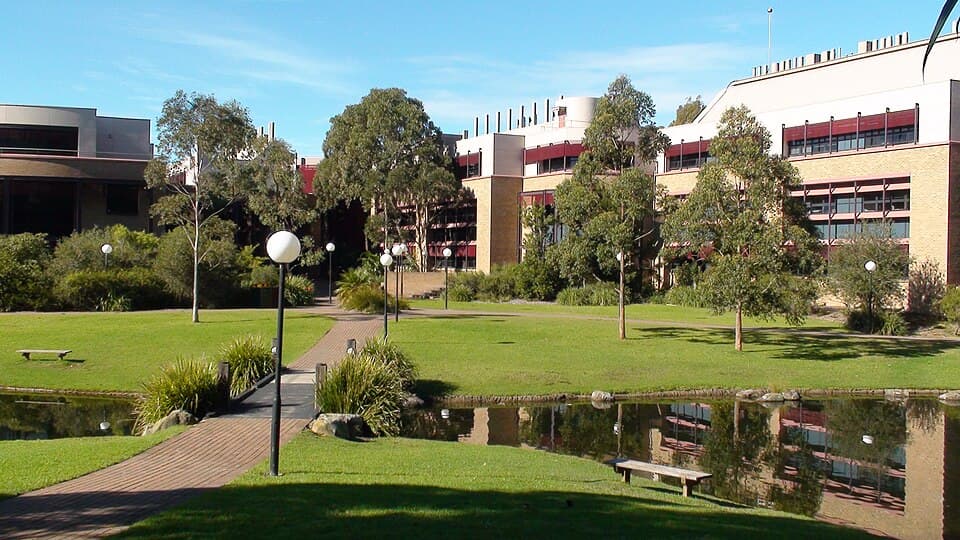 Students in a modern lecture hall at University of Wollongong GIFT City Campus