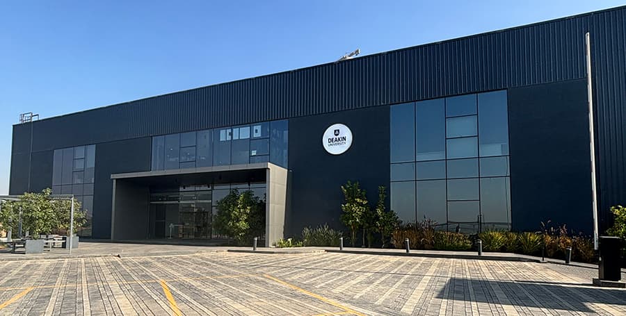 Diverse students collaborating on a project at Deakin University GIFT City campus